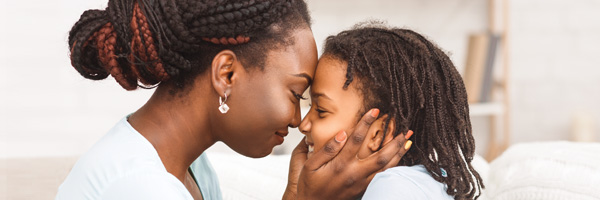 mom holding child
