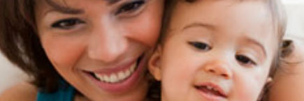 mom holding child