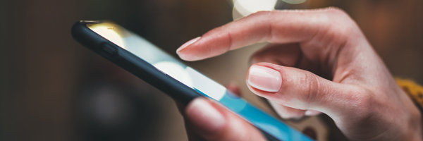 close up of hand texting