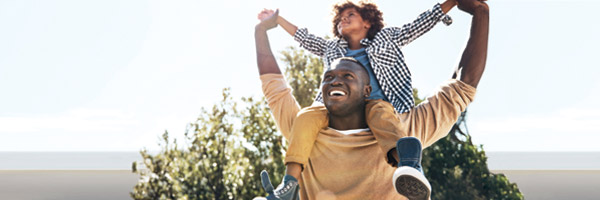 man holding child