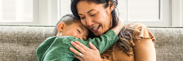 mother holding son