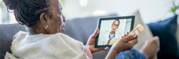 woman looking at ipad